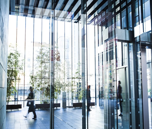 customer-stories-customer-cs people waling inside a building